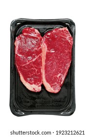 Premium Cut Of Beef On A Black Plastic Tray. Strip Loin Steak With Excellent Marbling. Meat Industry Product. Isolated On White