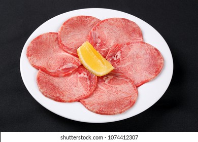 Premium Japanese beef tongue sliced on plate for BBQ