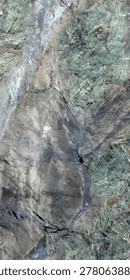 Premium marble texture featuring elegant blue, grey, and soft green mineral tones with intricate natural veining and abstract stone formations. The polished surface creates a luxurious and artistic appearance, ideal for interior design, ceramic tiles, wall cladding, countertops, flooring, architectural projects, and high-end decorative backgrounds.