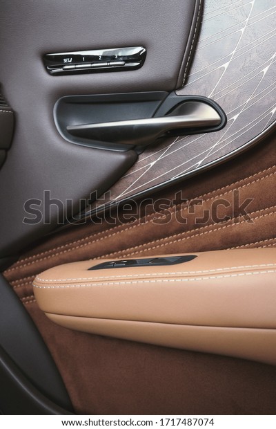 Premiun\
Automobile interior design and beige, grey, brown color leather\
textures. Luxury car sheathing details\
closeup.