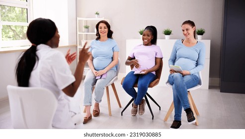 Prenatal Trainer Class. Young Women Pregnancy And Parenthood - Powered by Shutterstock