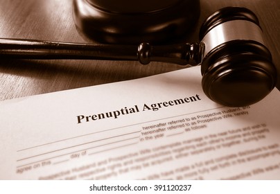 Prenuptial marriage agreement with a gavel                               