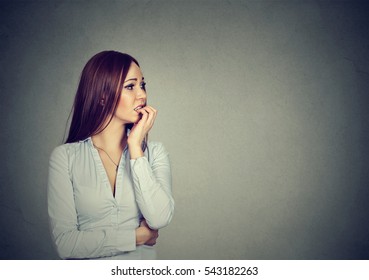 Preoccupied Anxious Young Woman Biting Her Fingernails 