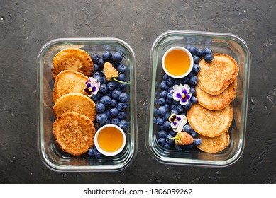 Prep Meal. Pancakes With Blueberries, Yellow Raspberries And Fresh Floral Honey In Glass Containers. Summer Snack For The Whole Family. Top View.