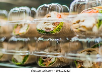 Pre-packaged sandwiches put up for sale in a commercial refrigerator - Shutterstock ID 1951232824