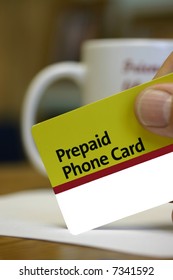 Prepaid Phone Card In Man's Hand