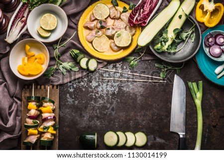 Similar – Foto Bild Hähnchenspieße mit Zucchini und Paprika zubereiten