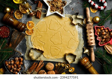 Preparation of Christmas pastries and sweets. Dough for baking homemade ginger cookies. Free space for text. - Powered by Shutterstock