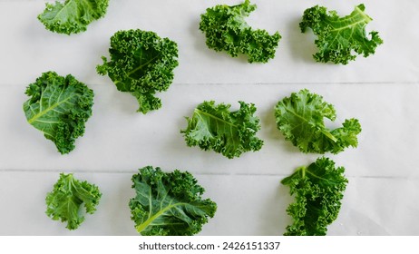 Preparation close up kale chips with white background.
 - Powered by Shutterstock