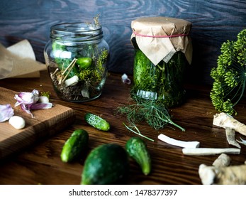 Preparation Of Green Dill Pickle On Wooden Table