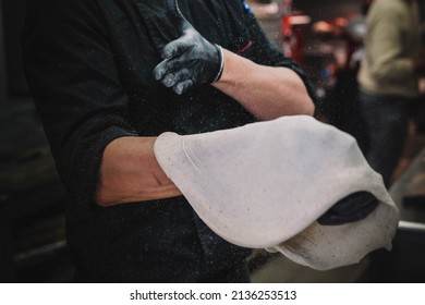 Preparation Of A Homemade Italian Style Pizza By A Specialist
