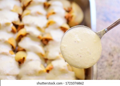 Preparation Of Homemade Lumaconi Filled In With Tomato Sauce And Minced Meat. Adding Some Cheese And Béchamel Sauce. Italian Pasta Recipe