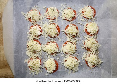 Preparation Of Keto Pizza Pepperoni Bites With No Crust Ready For Baking. Pepperoni, Cream Cheese And Mozzarella Cheese Appetizers.