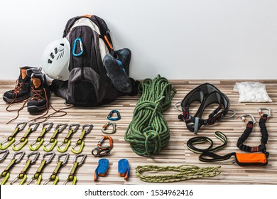 Preparation for a mountain trip - packing climbing equipment.