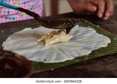 Preparation Of Oaxacan Mole And Tamales From Oaxaca Mexico In A Traditional Way On Day Of The Dead.