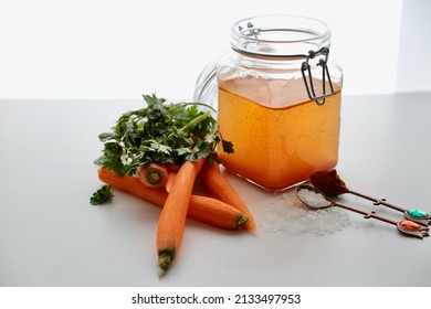 Preparation Of Pickled Carrots On A White Background. Pickle Juice Is Given In The Jar, Along With The Added Materials. It Is A Traditional Pickle Type Prepared In Turkish Cuisine. It Contains Red Pep