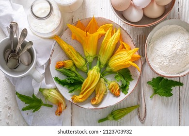 Preparation For Roasted Pumpkin Flower Made Of Pancake Batter. Deep Fried Yellow Squash Flower.