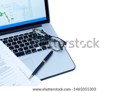 Preparation for signing a loan agreement. Laptop, glasses, and a ballpoint pen, isolated on a white background