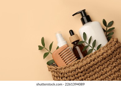 Preparation for spa. Compact toiletry bag with different cosmetic products on beige background, flat lay. Space for text - Powered by Shutterstock