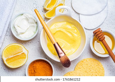 Preparation of turmeric face mask with honey and yogurt.