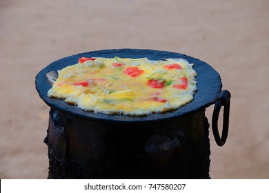 Preparation Of The Typical Street Food In Uganda And East Africa Called Rolex.