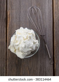 Preparation Of Whipped Cream With A Hand Mixer Metal On A Wooden Background. Top View. Mascarpone.