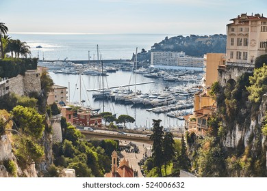 Preparation for a World Fair of the yacht show Monaco from railway station Monaco, is placed by megayachts, MYS, on the horizon yachts, the old city of Monaco
