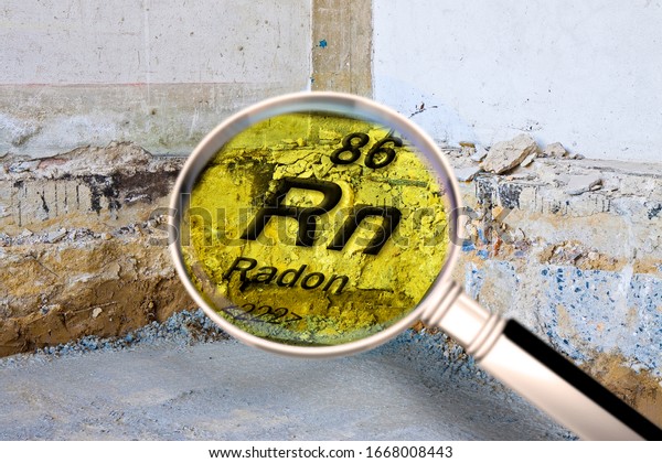 Preparatory stage for the construction\
of a ventilated crawl space in an old brick building - Searching\
gas radon concept image seen through a magnifying\
glass.