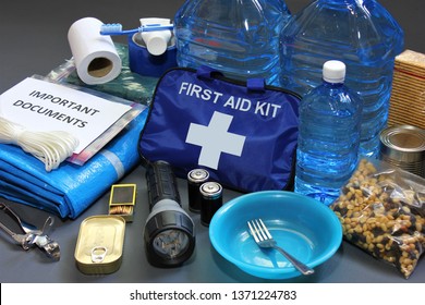 Prepare in advance for a natural disaster by putting together important items that will help you survive.Water,food,shelter,light source,first aid kit are just a few of the items needed to survive. - Shutterstock ID 1371224783