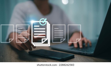 Prepare check and approve concepts. Document management, paperless. Women touching on virtual screen to tick mark documents for online approve paperless quality assurance and ERP management.  - Shutterstock ID 2288262583
