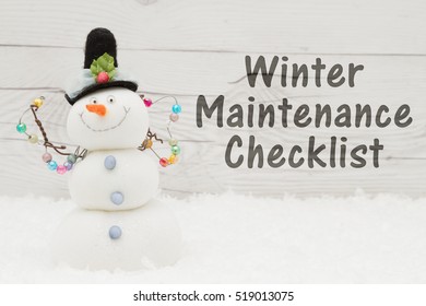 Prepare For Winter Message, Some Snow And A Snowman On Weathered Wood With Text Winter Maintenance Checklist