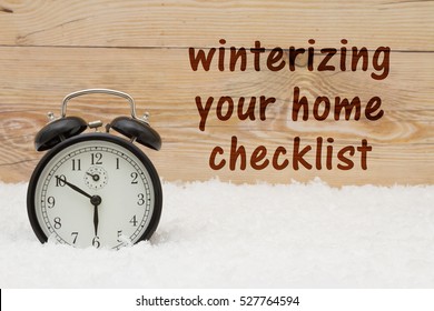 Prepare For Winter Message, Some Snow And An Alarm Clock On Weathered Wood With Text Winterize Your Home Checklist