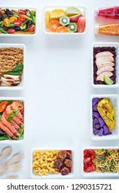 Prepared food delivery concept. Top view of assorted ready to eat meals over white background with copy space.
