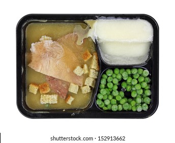 A Prepared Frozen Meal In A Black, Plastic Tray.