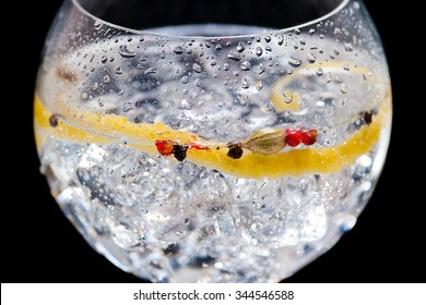 Prepared Gin And Tonic In The Foreground Isolated