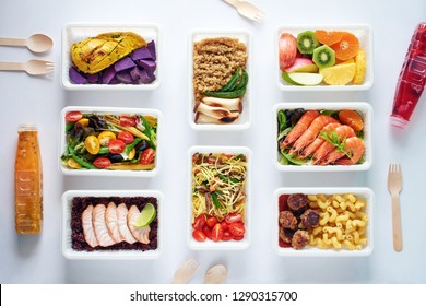 Prepared Meal Delivery Concept. Top View Of Assorted Ready-to-eat Dishes Over White Background. Healthy Eating. 