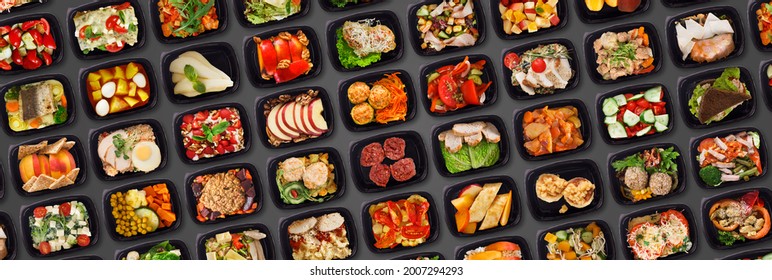 Prepared Meal Delivery Service. Set Of Black Plastic Containers With Tasty Food Flat Lay Over Dark Background, Collection Of Take Away Boxes With Healthy Eats Over Dark Backdrop, Panorama, Top View