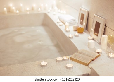 Prepared night spa bath decorated with candles, - Powered by Shutterstock