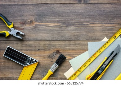 Preparing For Appartment Repair. Set Of Construction Tools On Wooden Table Background Top View Copyspace