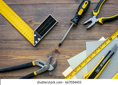 Preparing For Appartment Repair. Set Of Construction Tools On Wooden Table Background Top View