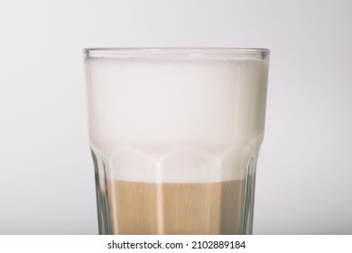 Preparing A Caffe Latte Style Hot Drink From Espresso And Milk