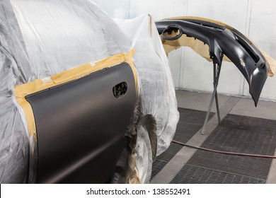 Preparing The Car And Car Bumper For Painting On Body Shop