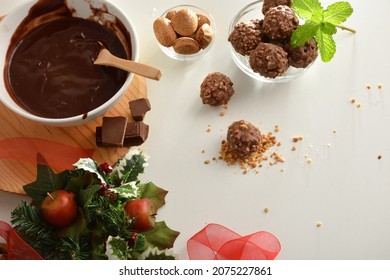 Preparing Chocolate Balls With Almond Chips On A White Kitchen Bench. Top View. Horizontal Composition.