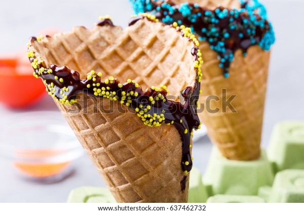 Preparing Chocolate Dipped Ice Cream Cones Royalty Free Stock Image