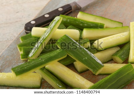 preparing courgette batons