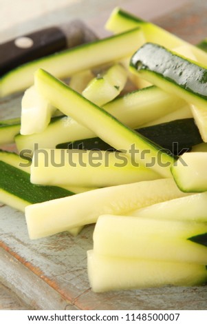 preparing courgette batons