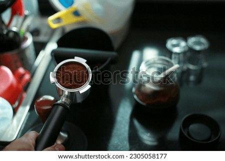 The preparing a cup of americano using espresso machine. Taste richer and perfect taste note. Photograph contain minimal grain and noise.