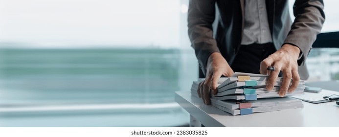 Preparing documents to attend the meeting, Checking documents that employees have brought in the office, Arrange printed information into relevant categories.