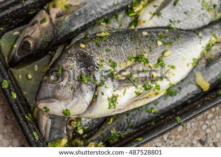preparing fish for grilling