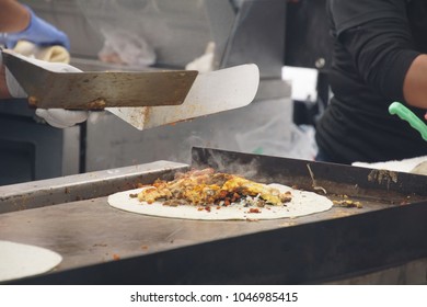 Preparing Food On A Grill For  The Ballard Farmer's Market On A Spring Day In Seattle, Washington